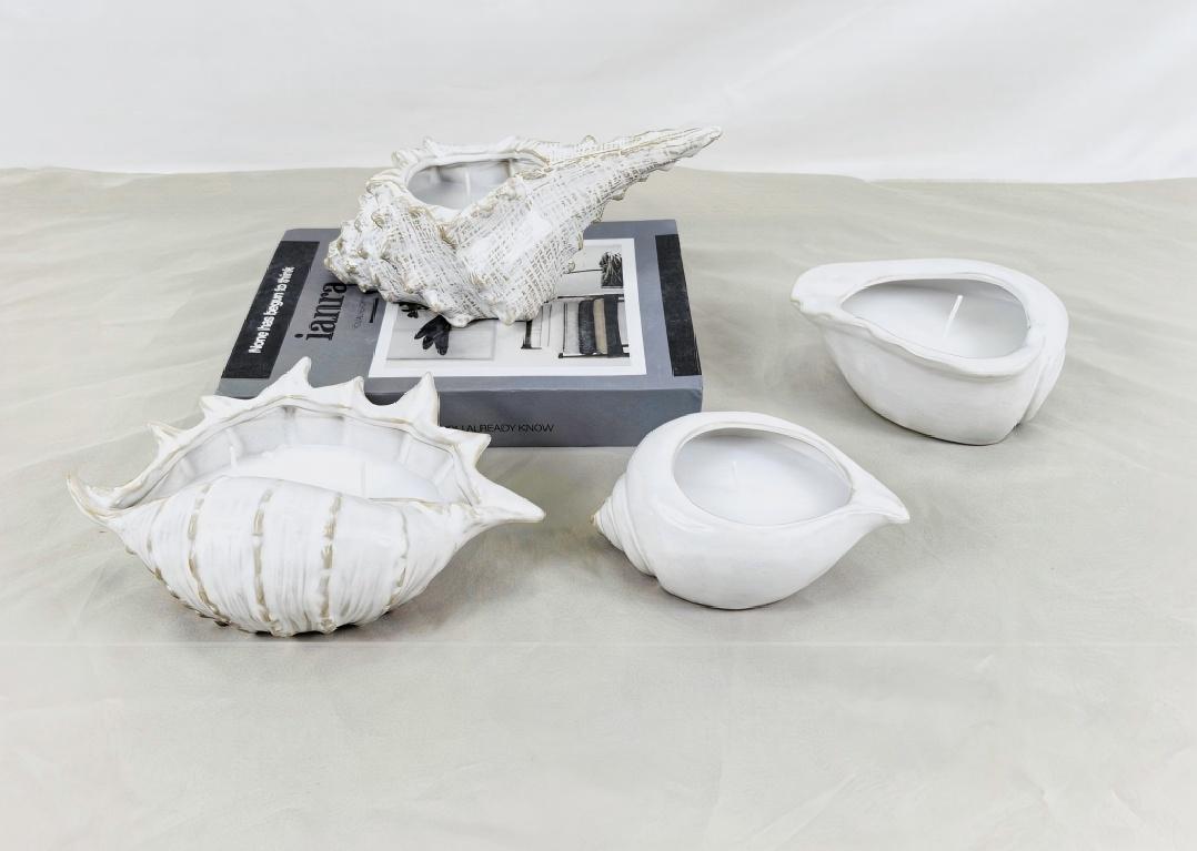 Свещниците се предлагат под много форми. Виждали ли сте някога една форма като раковина?