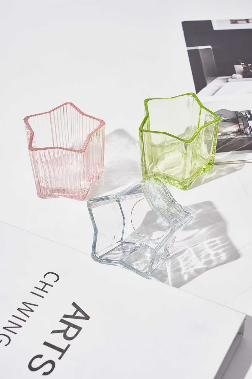 Държач за стъклени свещи във формата на звезда Държач за стъклени свещи във формата на звезда